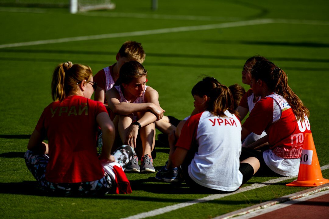 Trainer coaching a small group during a role play exercise